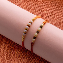 Vibrant Set of 2 Rakhis with Pearls
